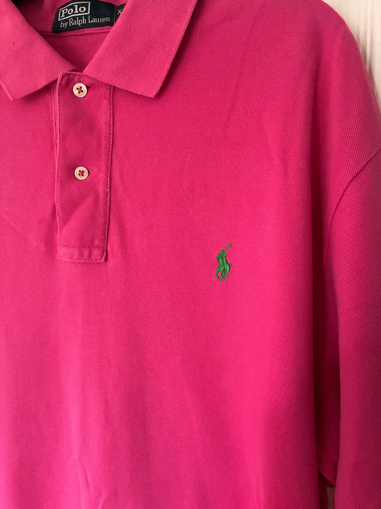 Men’s short sleeve pink Ralph Lauren polo. Size XL.