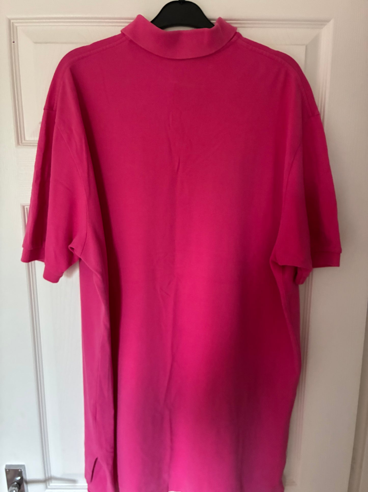 Men’s short sleeve pink Ralph Lauren polo. Size XL.