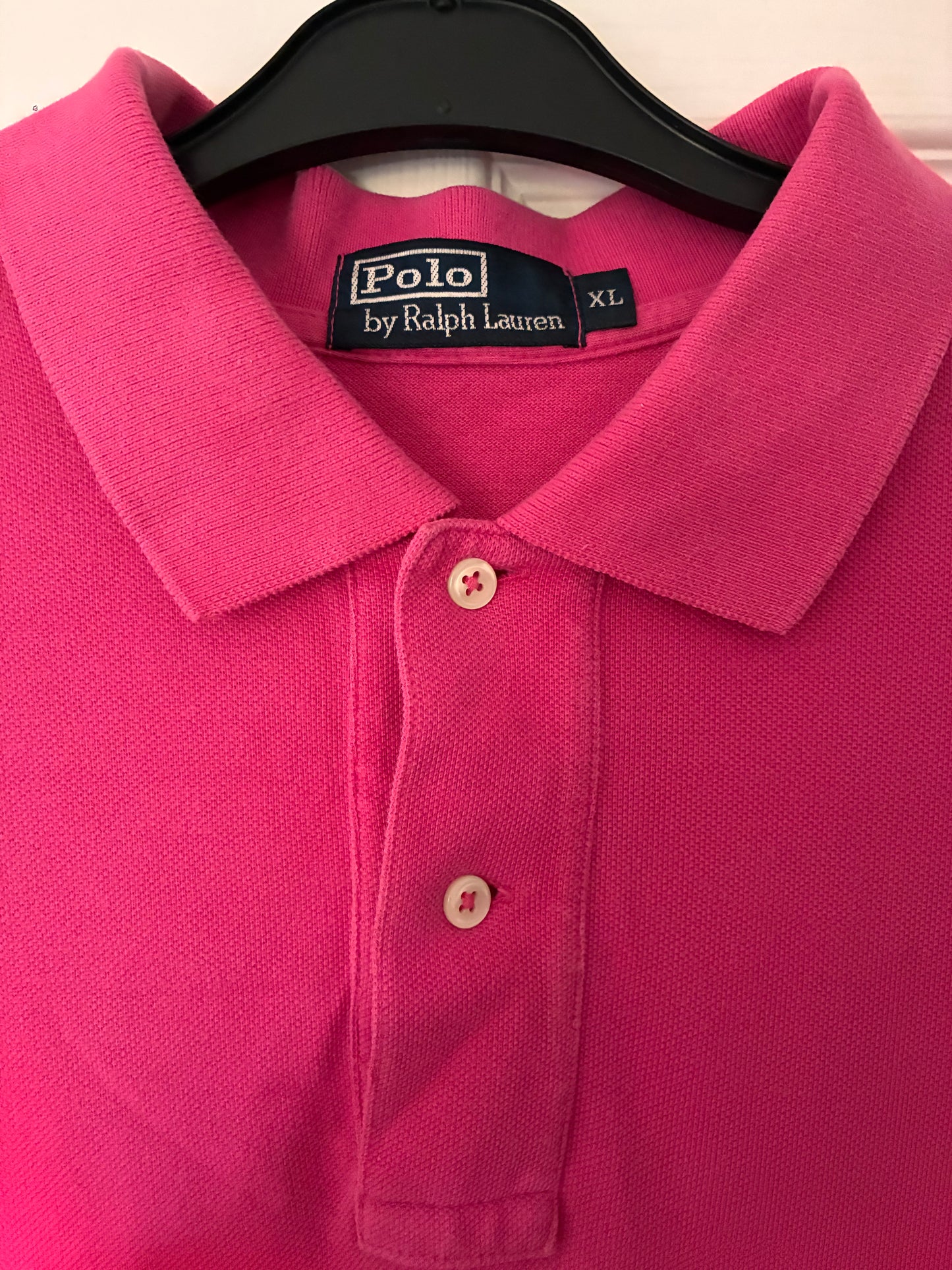 Men’s short sleeve pink Ralph Lauren polo. Size XL.
