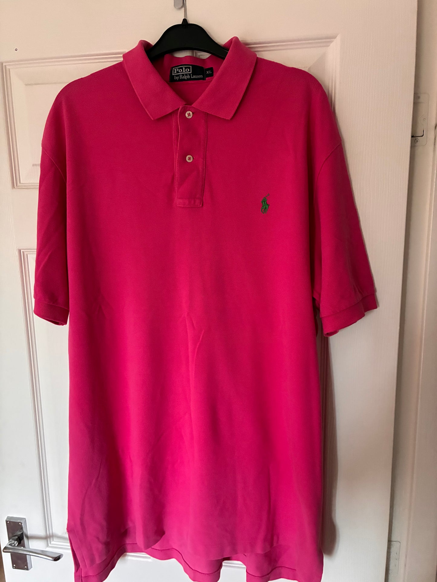 Men’s short sleeve pink Ralph Lauren polo. Size XL.