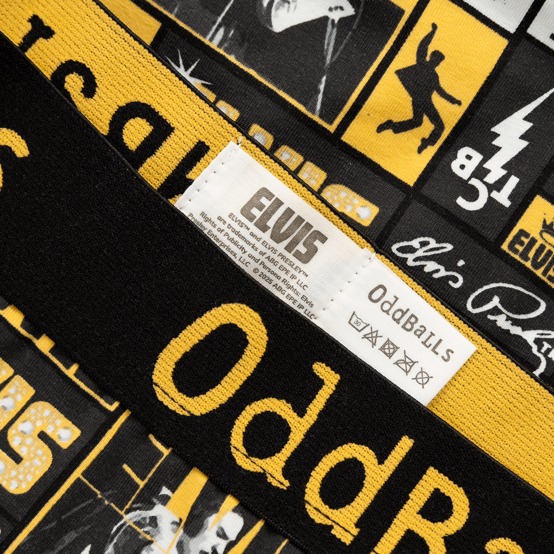 Black and yellow belt with 'Elvis' and 'OddBalls' branding.